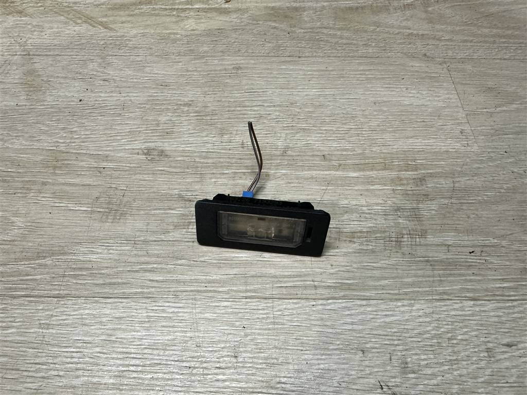 BMW 5-серия F10/F11 2009> для Фонарь подсветки номера