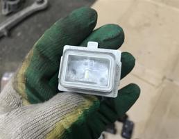 Фонарь подсветки номера для Mercedes-Benz W205 C-classe 2014-2018  запчасти бу